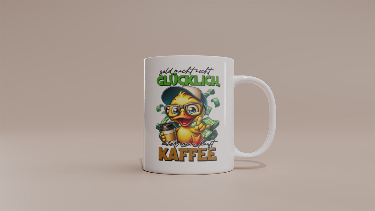 Video: Witzige Enten Tasse mit dem Spruch „Geld macht nicht glücklich, außer man kauft Kaffee“