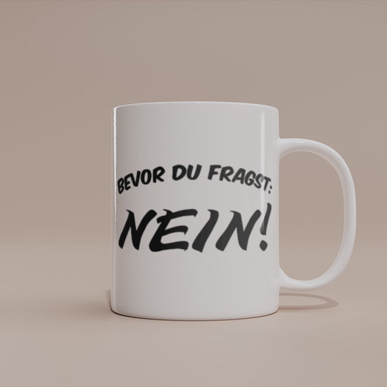 video - Lustige Sprüche Tasse – Bevor du fragst: NEIN!