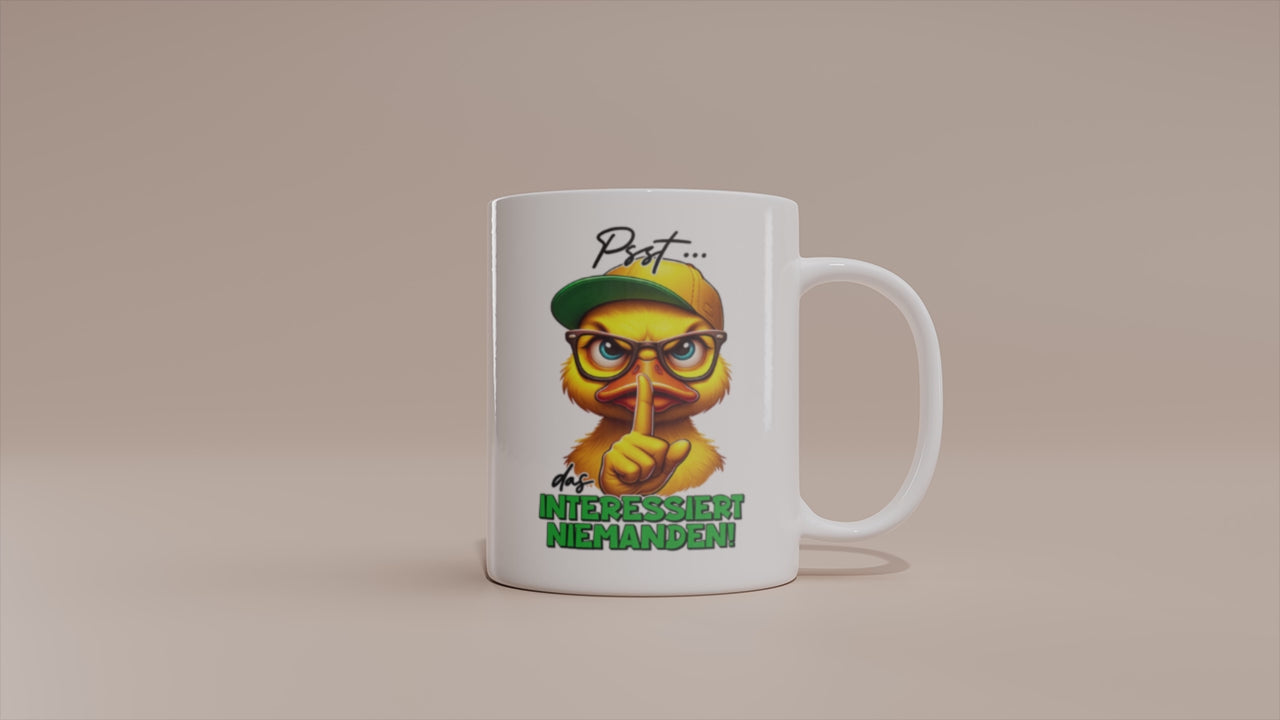 Video: Witzige Enten Tasse mit dem Spruch „Psst... das interessiert niemanden“.